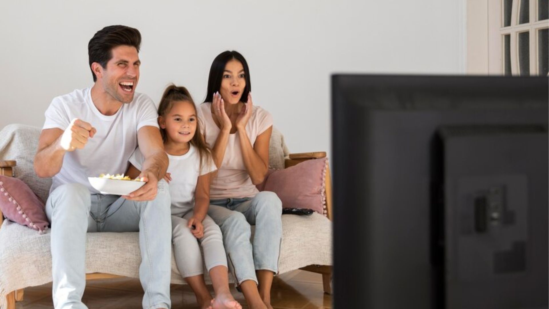 Família vendo Tv