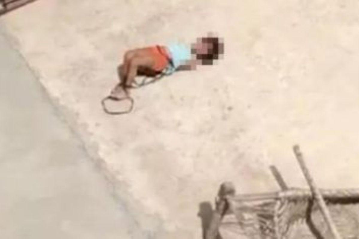 Menina indiana é gravada se contorcendo em telhado