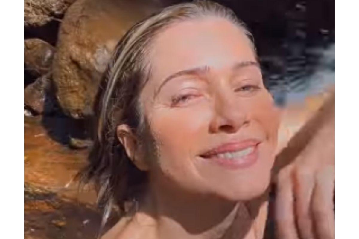 Leticia Spiller aproveita natureza com os filhos em cachoeira