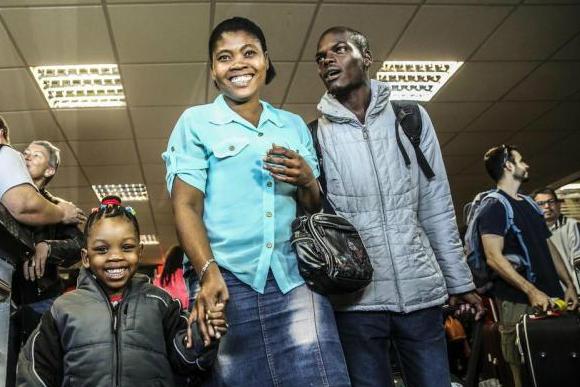 mãe e filhas haitianas se reencontram 2