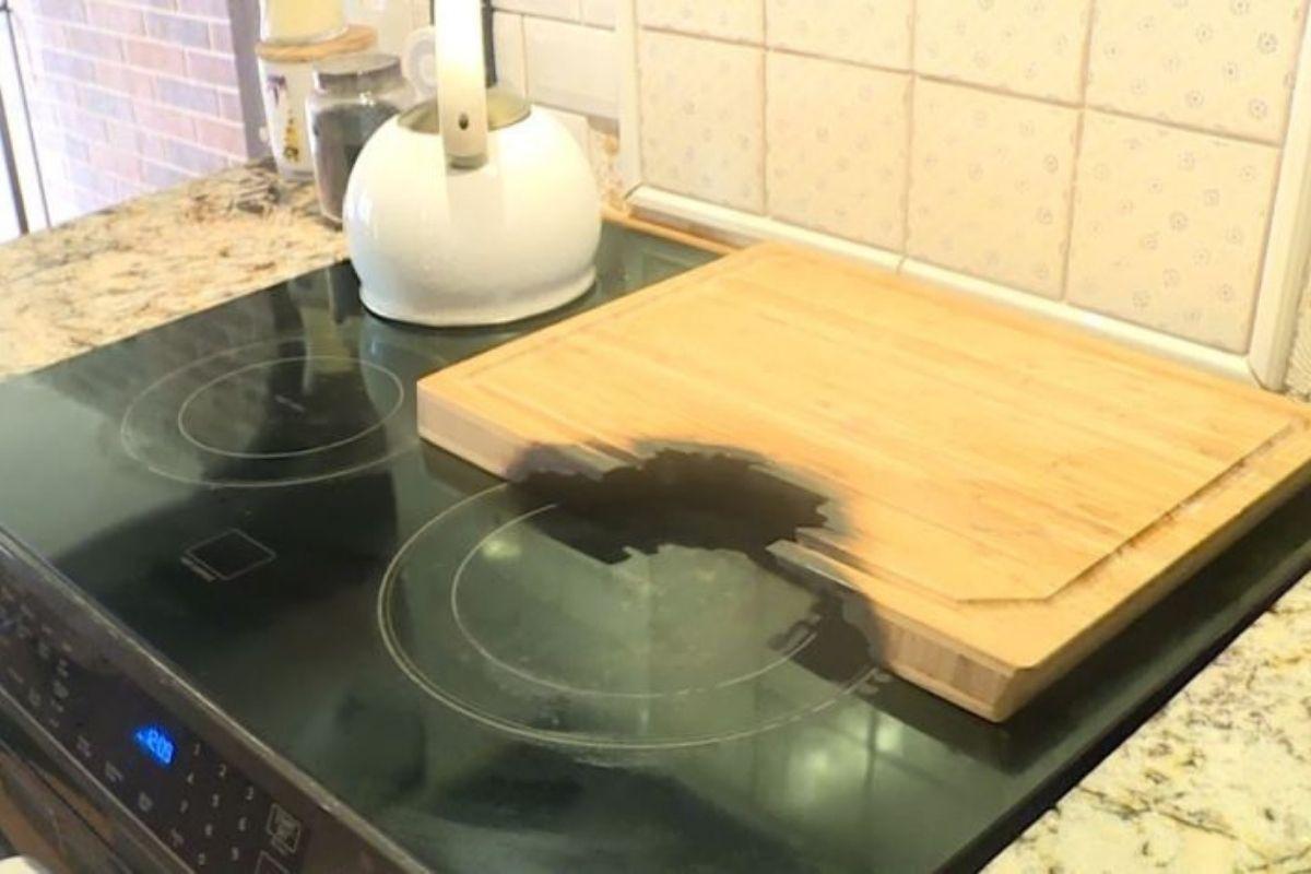 A causa do incêndio foi a tábua que queimou no fogão