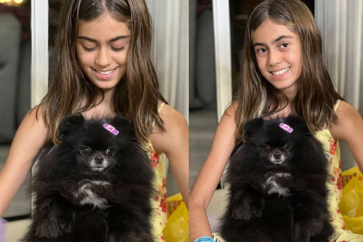 Filha da Giovanna Antonelli com cachorra no colo