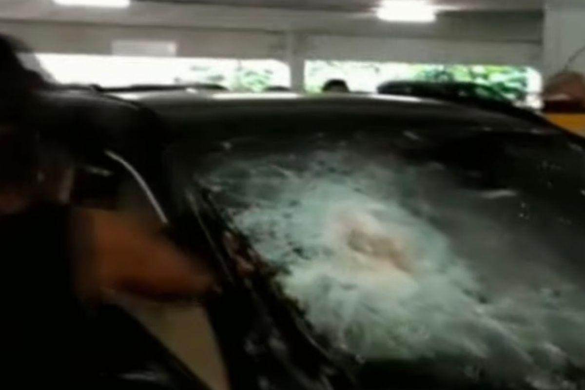 Polícia estourou vidro da BMW com uma picareta