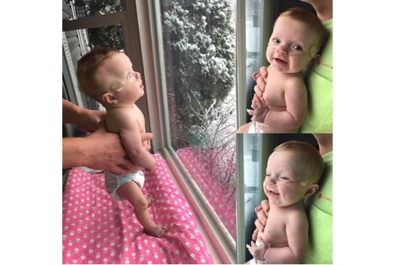 bebê vendo neve pela primeira vez