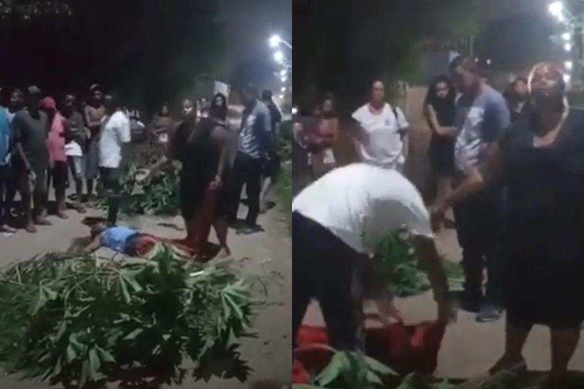 A mãe mostrou o filho morto no chão pelo mundo do crime, e depois cobriu seu corpo